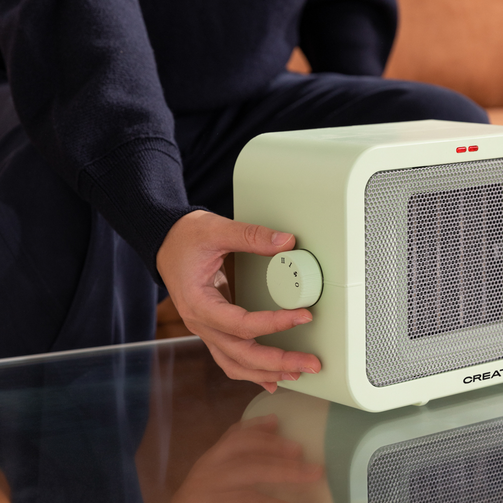 aeroterma electrica de birou create, 2 trepte de viteza, ideal pentru iarna/vara, functie ventilatie, termostat, placi de incalzire ceramice, protectie supraincalzire si rasturnare, inchidere automata, design compact, 1500 W, reglaj trepte de putere, pe masa