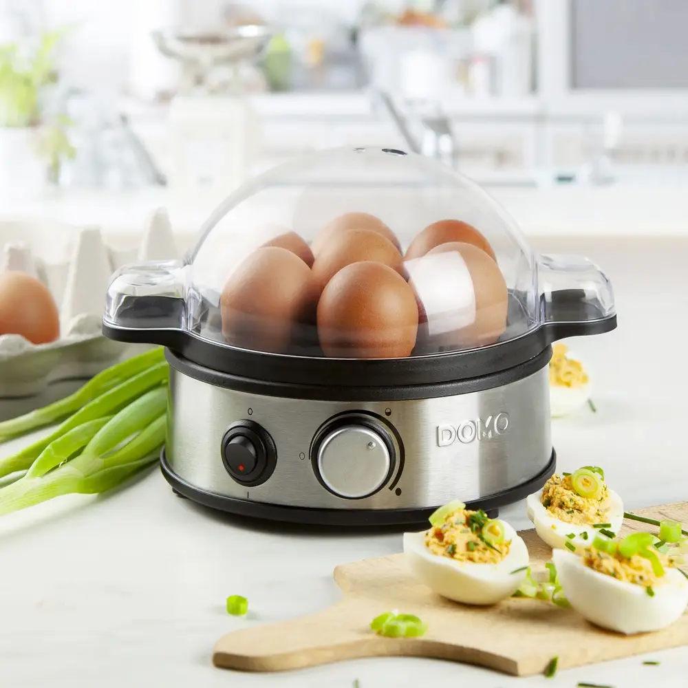 aparat pentru fierberea oualelor, domo, capacitate 7 oua, cu accesoriu cana gradata cu perforator, folosit in bucatarie pentru micul dejun sau sarbatori
